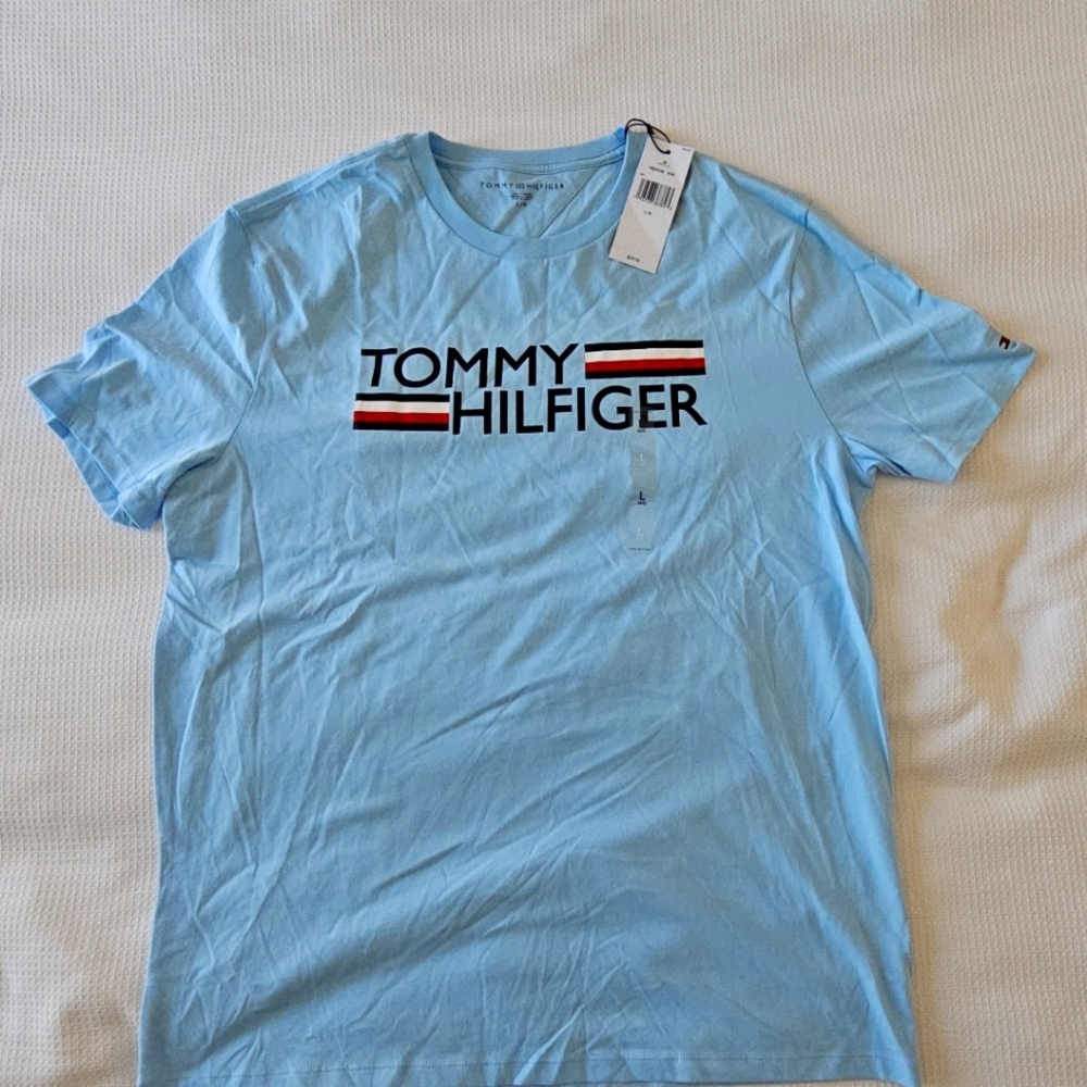 New Large Tommy Hilfiger T-shirt light blue in color